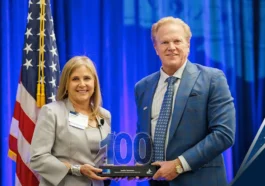 DOD’s Leslie Beavers Accepts 2024 Wash100 Award From Executive Mosaic CEO Jim Garrettson