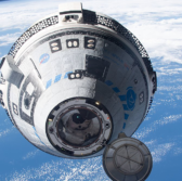 Boeing's Crewed Starliner Spacecraft Docks With International Space Station - top government contractors - best government contracting event